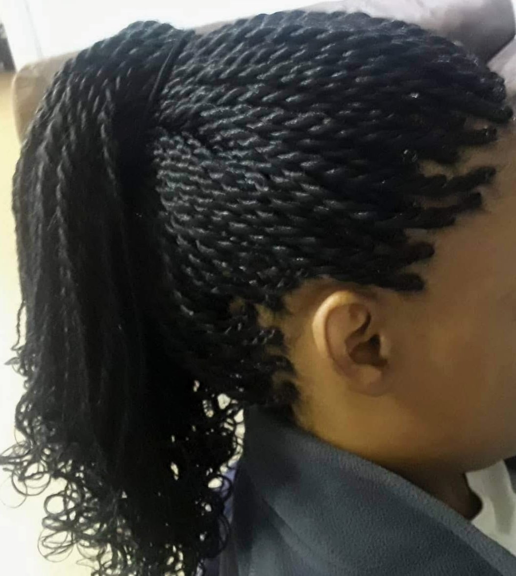Box Braids Pulled Back in Pony Tail