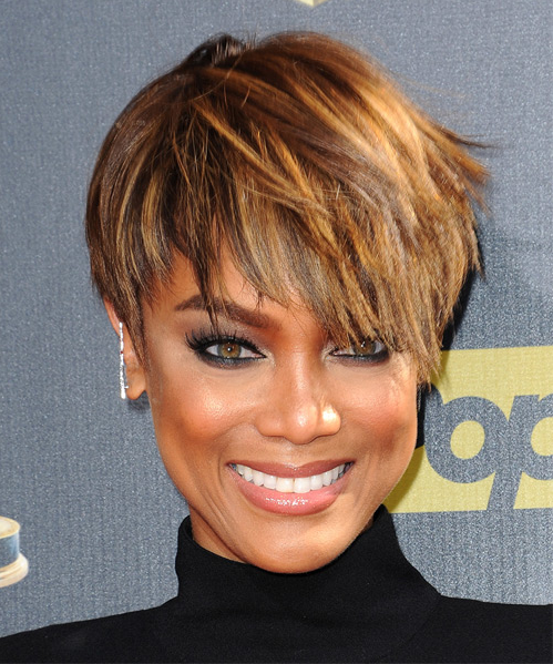Tyra Banks short straight sassy hairstyle with
